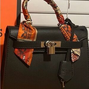 Black Leather Handbag with Scarf Accent